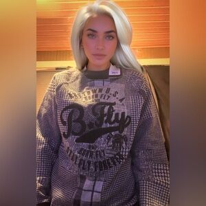 Black and Gray Crewneck Sweater that’s has its on unique look and unisex
